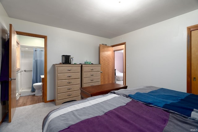 3506 Mark Ct, Lafayette, IN 47905 - bedroom with light carpet and ensuite bathroom