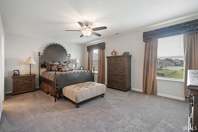 938 Sand Walk Ln, Kokomo, IN 46902 - bedroom with light carpet and a ceiling fan