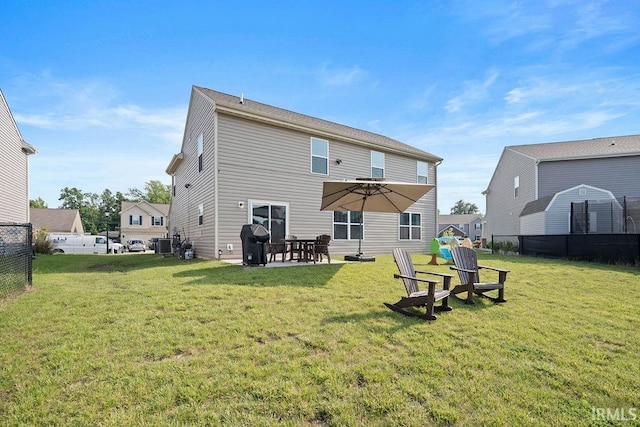 938 Sand Walk Ln, Kokomo, IN 46902 - back of property with a patio