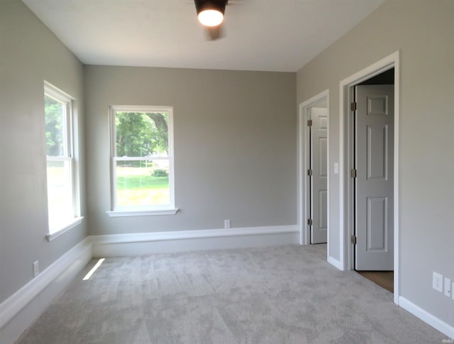 10239 State Road 26 E, Lafayette, IN 47905 - carpeted spare room featuring ceiling fan and baseboards