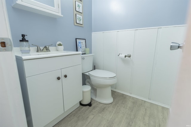 3623 Rexford Dr, South Bend, IN 46615 - half bathroom with wood finished floors and vanity