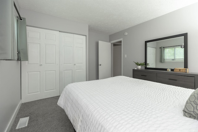 3623 Rexford Dr, South Bend, IN 46615 - carpeted bedroom featuring a closet and a textured ceiling