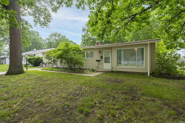 3623 Rexford Dr, South Bend, IN 46615 - single story home with a front lawn and a chimney