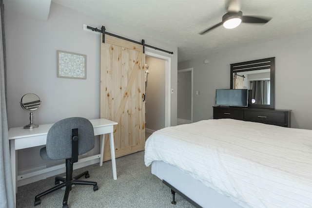 3623 Rexford Dr, South Bend, IN 46615 - carpeted bedroom with a barn door, an office area, and ceiling fan