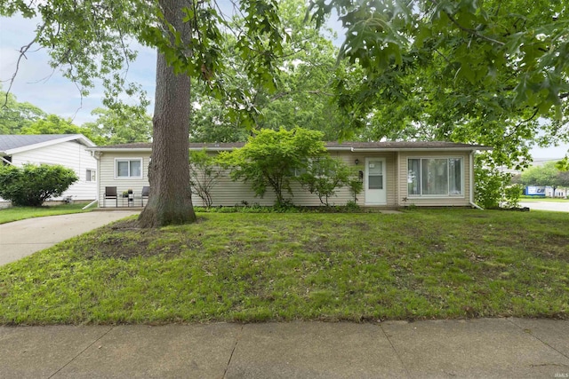 3623 Rexford Dr, South Bend, IN 46615 - ranch-style house with a front yard and driveway