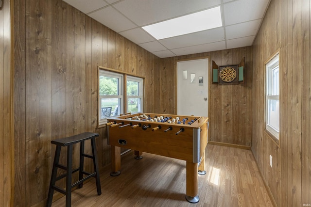 3623 Rexford Dr, South Bend, IN 46615 - rec room featuring a paneled ceiling, wood walls, and wood finished floors