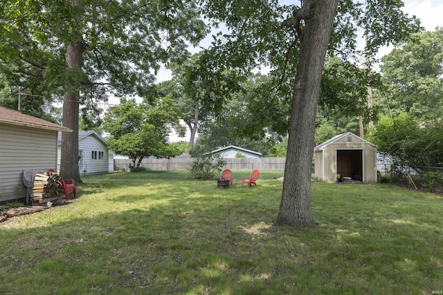 3623 Rexford Dr, South Bend, IN 46615 - fenced backyard with a storage unit