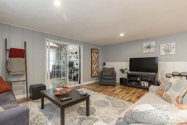 3623 Rexford Dr, South Bend, IN 46615 - living room featuring a decorative wall, wood finished floors, and recessed lighting
