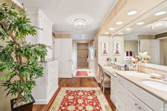 106 River Cove Ln, North Manchester, IN 46962 - bathroom with vanity, wood finished floors, a chandelier, crown molding, and recessed lighting