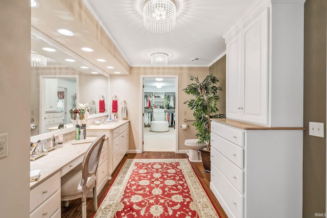 106 River Cove Ln, North Manchester, IN 46962 - bathroom featuring vanity, wood finished floors, recessed lighting, a closet, and a chandelier