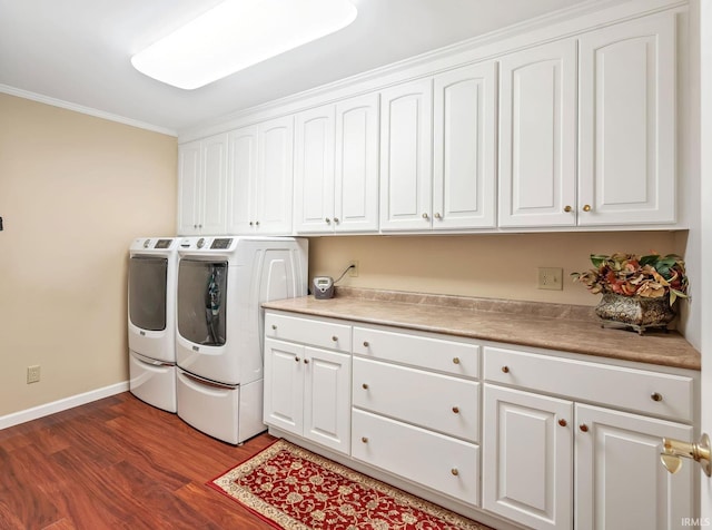 106 River Cove Ln, North Manchester, IN 46962 - washroom with cabinet space, washing machine and dryer, dark wood-type flooring, and ornamental molding