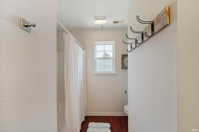 1009 Elliott St, Lafayette, IN 47905 - full bath featuring toilet and wood finished floors