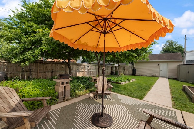 1009 Elliott St, Lafayette, IN 47905 - view of patio / terrace featuring a shed