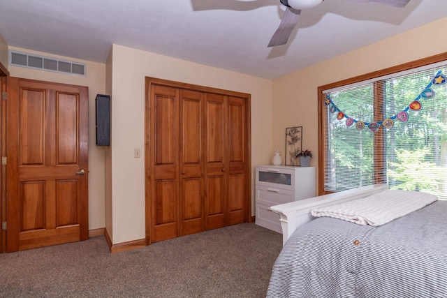 5549 S Tammany Ct, Bloomington, IN 47401 - carpeted bedroom featuring a closet and a ceiling fan