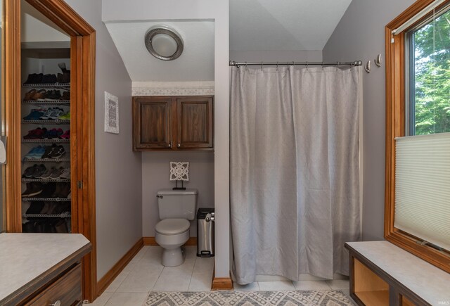 5549 S Tammany Ct, Bloomington, IN 47401 - full bathroom featuring tile patterned flooring and curtained shower