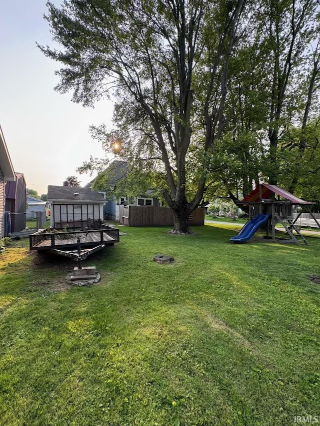 115 N Posey St, Windfall, IN 46076 - view of yard with a playground and a wooden deck