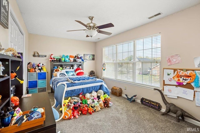 4103 Stergen Dr, Lafayette, IN 47909 - carpeted bedroom with a ceiling fan and a closet