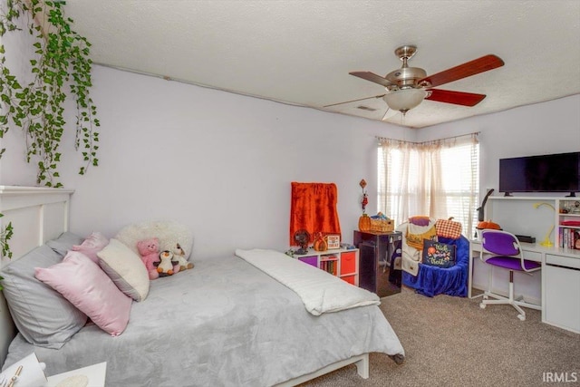 4103 Stergen Dr, Lafayette, IN 47909 - carpeted bedroom with an office area and a ceiling fan