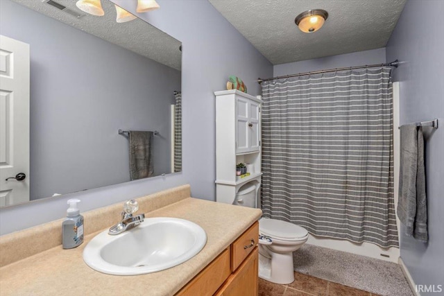 4103 Stergen Dr, Lafayette, IN 47909 - bathroom featuring vanity, a textured ceiling, and tile patterned floors