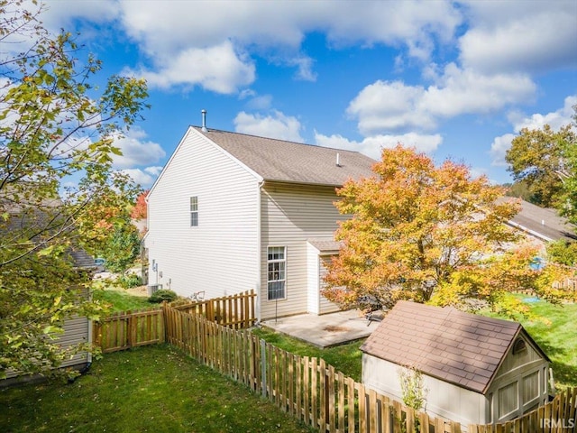 4103 Stergen Dr, Lafayette, IN 47909 - back of house featuring a fenced backyard, a patio, and a storage shed