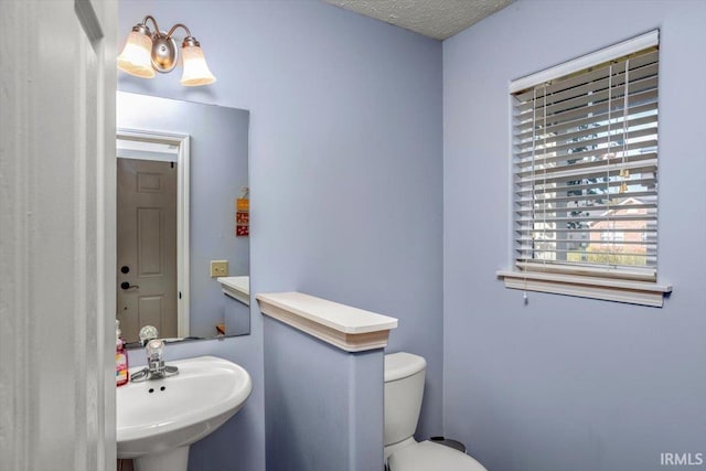 4103 Stergen Dr, Lafayette, IN 47909 - half bathroom with a sink and toilet