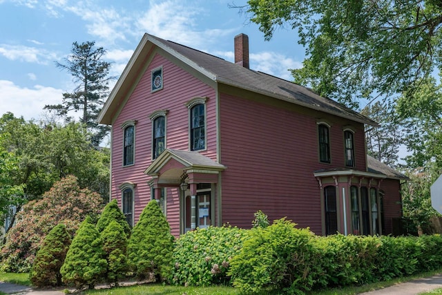 302 C St, Laporte, IN 46350 - view of home's exterior with a chimney