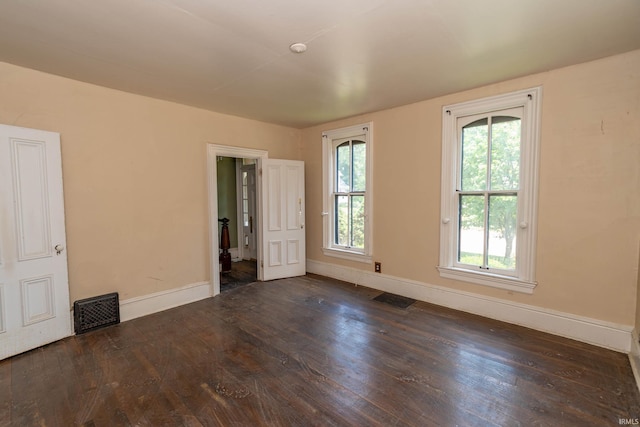 302 C St, Laporte, IN 46350 - empty room featuring wood finished floors and baseboards