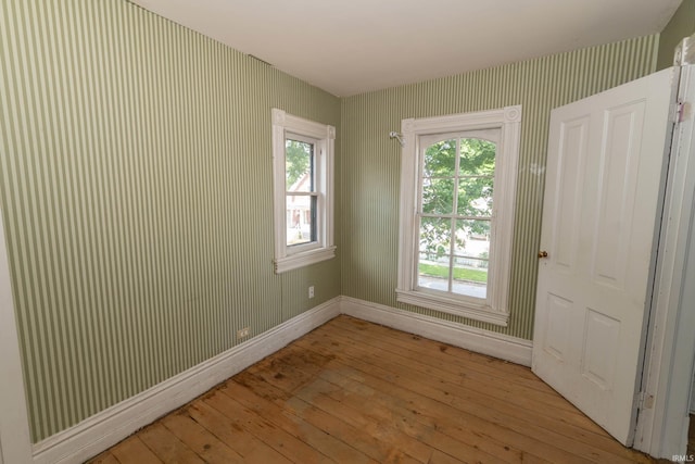 302 C St, Laporte, IN 46350 - unfurnished room with wood-type flooring and healthy amount of natural light