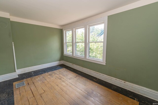 302 C St, Laporte, IN 46350 - empty room with baseboards and dark wood finished floors