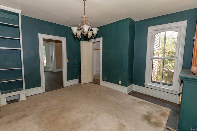 302 C St, Laporte, IN 46350 - unfurnished dining area featuring a chandelier and carpet