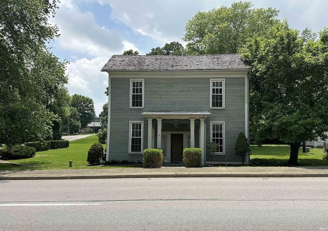 709 W Main St, Ellettsville, IN 47429 - view of front of house featuring a front yard