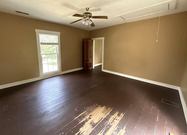 709 W Main St, Ellettsville, IN 47429 - empty room featuring hardwood / wood-style floors and ceiling fan