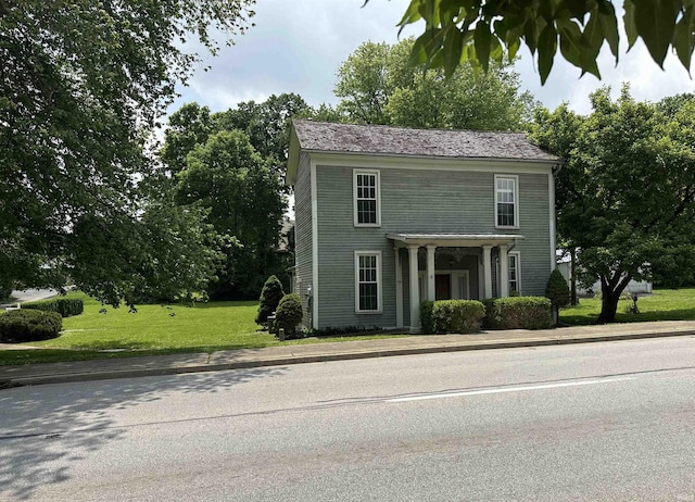 709 W Main St, Ellettsville, IN 47429 - view of front of property with a front lawn