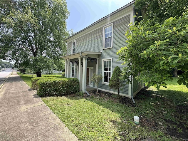 709 W Main St, Ellettsville, IN 47429 - view of front of home featuring a front yard