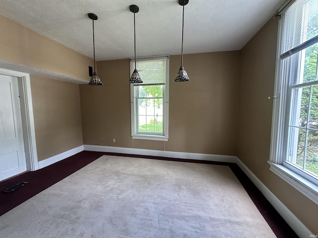 709 W Main St, Ellettsville, IN 47429 - unfurnished room featuring dark carpet and a textured ceiling