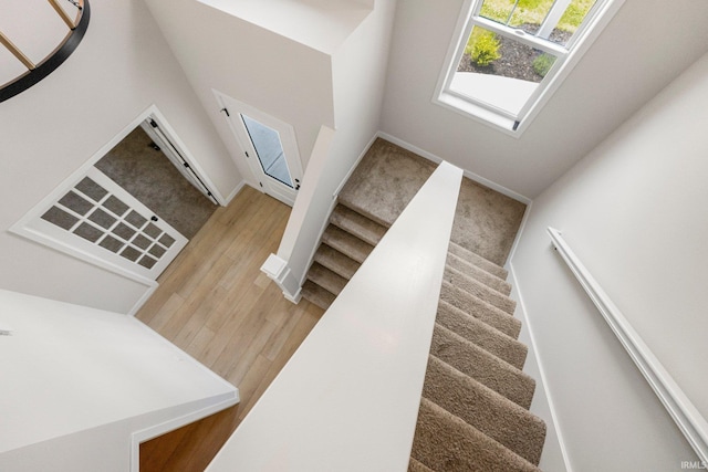 17464 Sonic Ct, Huntertown, IN 46748 - stairway featuring wood finished floors
