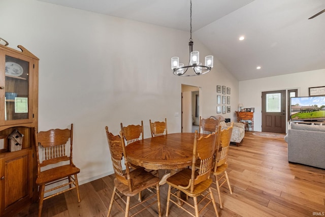 502 N Jefferson Ave, Fowler, IN 47944 - dining space with high vaulted ceiling, a chandelier, light wood-style flooring, and recessed lighting