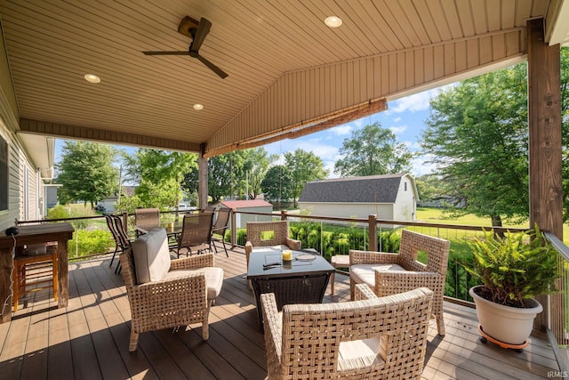 502 N Jefferson Ave, Fowler, IN 47944 - wooden terrace with outdoor dining area, outdoor lounge area, and a ceiling fan