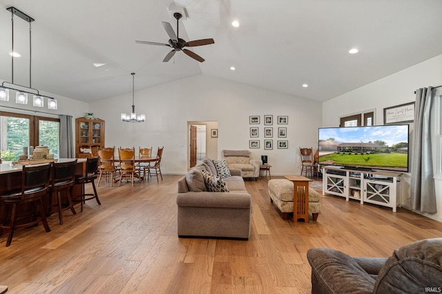 502 N Jefferson Ave, Fowler, IN 47944 - living room featuring high vaulted ceiling, a ceiling fan, light wood-type flooring, recessed lighting, and a chandelier