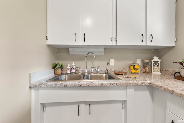 6031 S Calhoun St, Fort Wayne, IN 46803 - kitchen with white cabinetry and light countertops