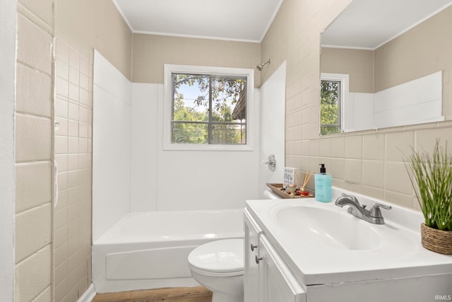 6031 S Calhoun St, Fort Wayne, IN 46803 - full bathroom featuring vanity, ornamental molding, bathtub / shower combination, and wood finished floors