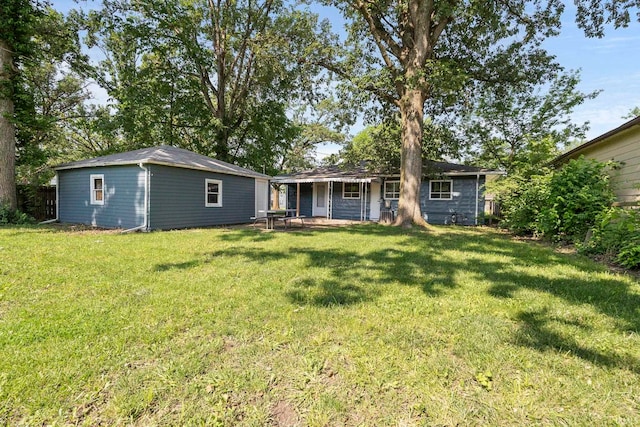 6031 S Calhoun St, Fort Wayne, IN 46803 - view of front of property with an outbuilding and a front yard