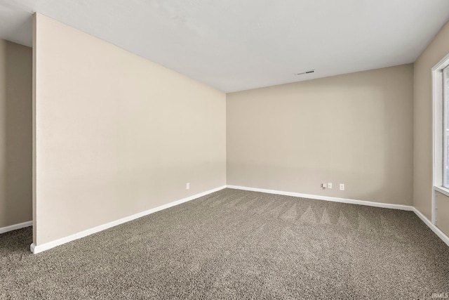 6031 S Calhoun St, Fort Wayne, IN 46803 - carpeted empty room featuring baseboards