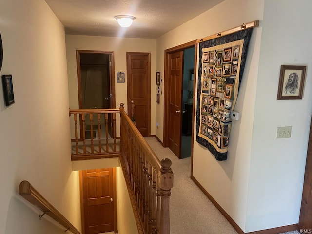 12344 Diamond Dr, Plymouth, IN 46563 - hall featuring an upstairs landing and carpet