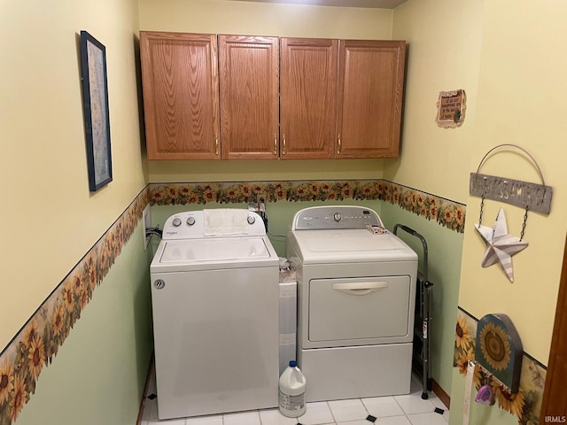 12344 Diamond Dr, Plymouth, IN 46563 - laundry area featuring cabinet space and washing machine and clothes dryer