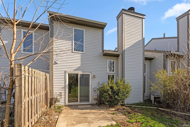 7104 Thamesford Dr Unit 83, Fort Wayne, IN 46835 - back of property featuring a chimney