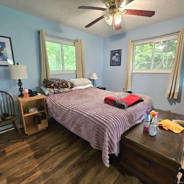 989 S Cataract Rd, Spencer, IN 47460 - bedroom featuring wood finished floors, a textured ceiling, and a ceiling fan