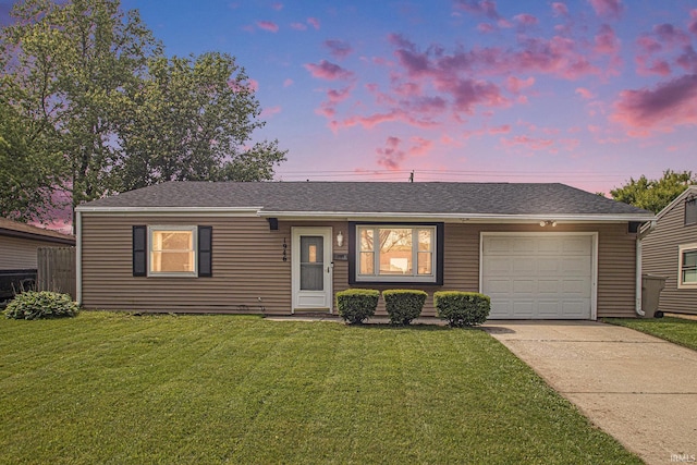 1946 Renfrew Dr, South Bend, IN 46614 - single story home with driveway, a garage, a front lawn, and roof with shingles