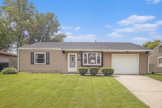 1946 Renfrew Dr, South Bend, IN 46614 - view of front of property featuring a garage, driveway, a front lawn, and roof with shingles