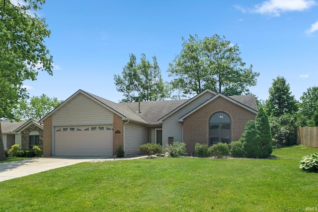 2319 Autumn Lake Pl, Fort Wayne, IN 46818 - single story home featuring brick siding, an attached garage, and concrete driveway